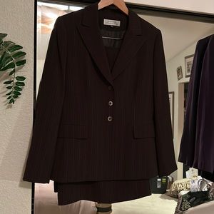 This Tahari business suit takes work to a whole different level in a size 10.